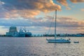 Sailboat in the harbor and view of Silo Point at sunset, in Canton, Baltimore, Maryland Royalty Free Stock Photo