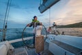 Sailboat helmsman at his watch