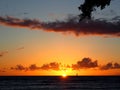 Sailboat on the Horizon at Waikiki Sunset Royalty Free Stock Photo