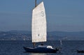 Junk rigged cruising sailboat. Royalty Free Stock Photo