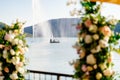 Sailboat on lake at fountain through ruck flowers