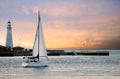 Sailboat leaving marina Royalty Free Stock Photo