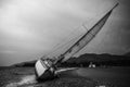 Sailboat left on the beach after strorm