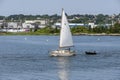 Sailboat Marselgem sailing along New Bedford waterfront Royalty Free Stock Photo