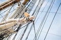 Sailboat masts, rigging and rolled up sails