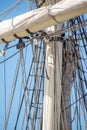 Sailboat masts, rigging and rolled up sails Royalty Free Stock Photo