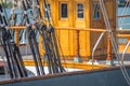 Sailboat masts, rigging and rolled up sails