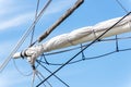 Sailboat masts, rigging and rolled up sails Royalty Free Stock Photo