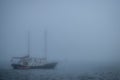 Sailboat in the mist