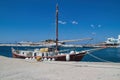 Sailboat moored in the blue expanse of the ocean on a sunny day