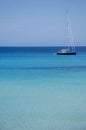 Sailboat moored in the calm and crystal clear waters. Majorca, Balearic Islands, Spain. Europe Royalty Free Stock Photo