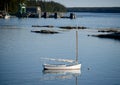 Sailboat in quaint and rural fishing village Royalty Free Stock Photo