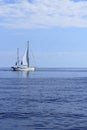 Sailboat sailing on blue sea horizon ocean Royalty Free Stock Photo
