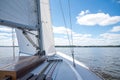 Sail boat sailing on the river Schlei in Germany on a sunny day Royalty Free Stock Photo