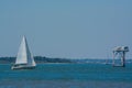 Sailboat sailing past the state line marker on the Cumberland Sound. Fernandina Beach, Nassau County, Florida USA