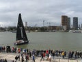 A sailboat is sailing in river meuse during the world harbour days in rotterdam Royalty Free Stock Photo