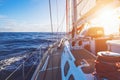 Sailboat sailing in sunset sea, yacht Royalty Free Stock Photo