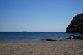 Sailboat on the sea horizon on a sunny September day. Kolimpia, Rhodes, Greece