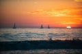 Sailboat at sea. Panoramic view of sunset over ocean. Beautiful serene scene. Sea sky concept, sunrise colors clouds