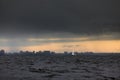 Sailboat in sea at stormy weather, stormy clouds sky orange sky, sail regatta, reflection of sail in the water, bigl