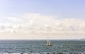 Sailboat at sea on a sunny day. Royalty Free Stock Photo
