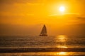 Sailboat at sea. Sunset at the sea. Sunrise on beach. Colorful ocean, nature landscape background with copy space. Royalty Free Stock Photo