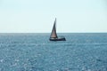 Sailboat sea wave water blue South sun glare blurred