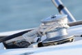 Sailboat winch and rope yacht detail, equipment for the boat control Royalty Free Stock Photo