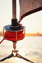 Sailboat winch, sail and nautical rope yacht detail. Yachting, marine background