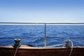 Sailboat winches wooden board blue sea horizon Royalty Free Stock Photo