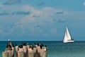 Sailboat, in windy, sunny day sailing along the horizon Royalty Free Stock Photo