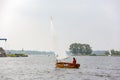 A sailboat with a woman sailing on the Kaag Royalty Free Stock Photo