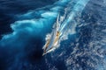 Sailboat yacht boat sails on blue water of ocean in a sailing race. Aerial top view Royalty Free Stock Photo