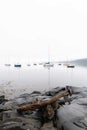 Sailboats anchored off the coast of New England Fog Royalty Free Stock Photo