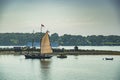 sailboats anchored in a bay of Maine coast fishing port