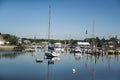 sailboats anchored in a bay of Maine coast fishing port