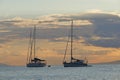 Sailboats in the bay of Cape Sounio where the temple of Poseidon is located