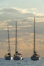 Sailboats in the bay of Cape Sounio where the temple of Poseidon is located