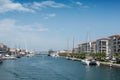 Sailboats and catamarans in the channel in Sete