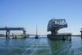 Sailboats cruising through an open swing bridge on the ICW