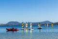 Sailboats on crystal clear blue water Royalty Free Stock Photo