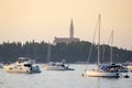 Sailboats in front of Saint Euphemia bell tower