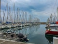 Sailboats in harbour with water reflections Royalty Free Stock Photo