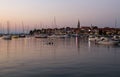 Sailboats in Izola harbor. Small town and its marina, located in the Southwestern Slovenia on the Adriatic coast.