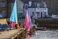 Sailboats landing at a jetty in the city of Lerwick in Shetland