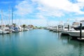 Sailboats moored in marina