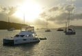 Sailboats and motorboats at anchor in the Bight with Tortola visible in the distance, Norman Island, BVI