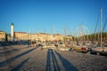 Sailboats in the old harbor of La Rochelle France at sunset