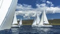 Sailboats participate in sailing regatta on the Sea. Royalty Free Stock Photo