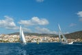 Sailboats participate in sailing regatta 12th Ellada Autumn 2014 among Greek island group in the Aegean Sea Royalty Free Stock Photo